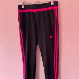 Pink and black Adidas track pants